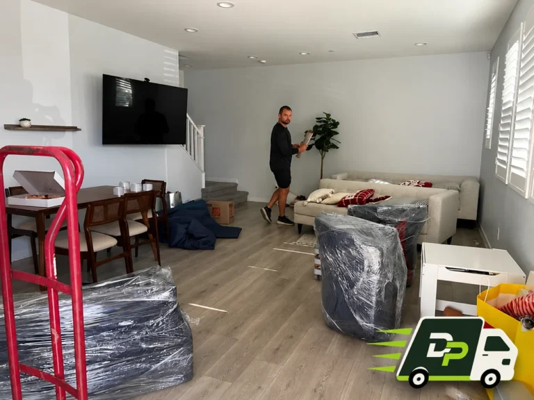 Smart movers carefully protecting furniture during a home move in Laguna Beach, CA