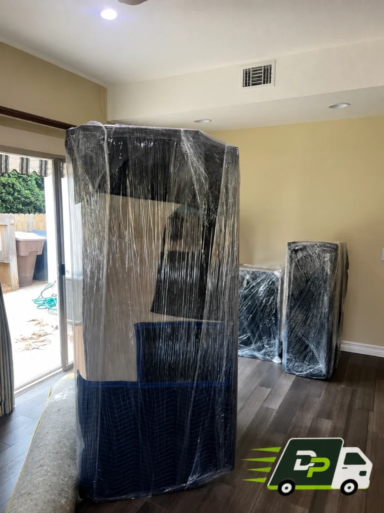Appliance moving company protecting furniture and large household items during a Dana Point move