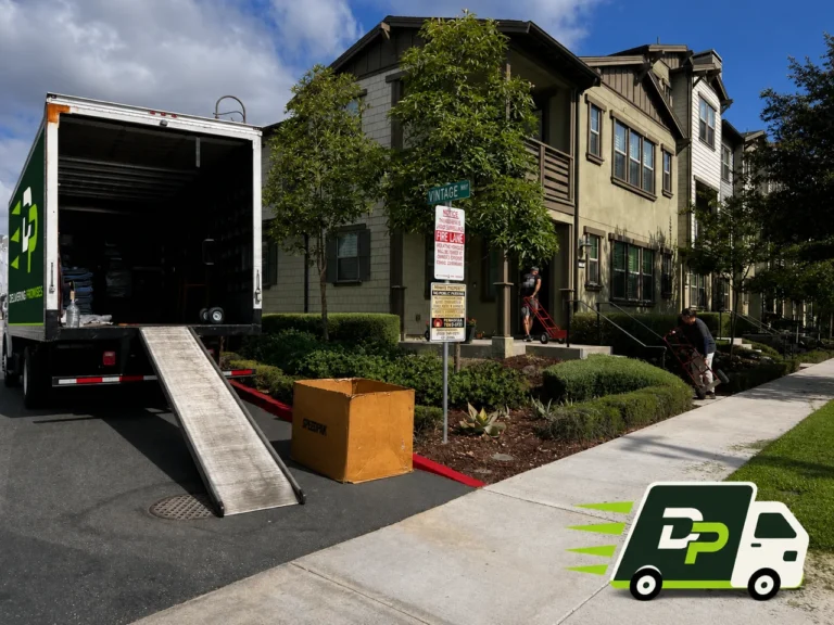 Cross country movers unloading a moving truck in Ladera Ranch, CA
